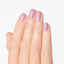hands wearing T80 Rice Rice Baby Nail Lacquer by OPI
