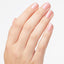 hands wearing S79 Rosy Future Nail Lacquer by OPI