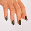 hands wearing U15 Things I've Seen Aber-Green Nail Lacquer by OPI