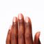 hands wearing L17 You've Got Nata On Me Gel Polish by OPI